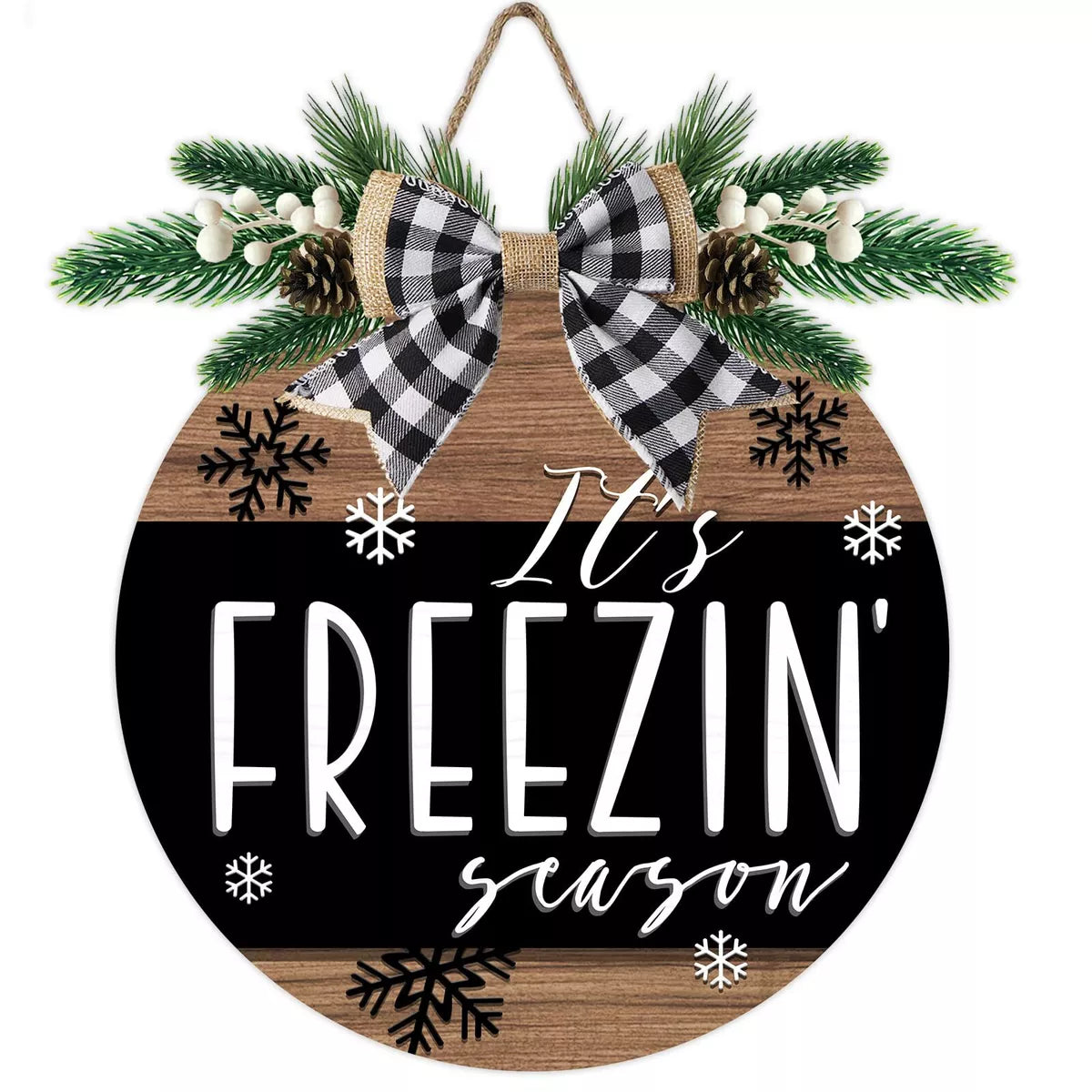 A circular door hanger with a winter theme, featuring text 'It's Freezin' Season' surrounded by snowflakes, evergreen branches, and pinecones.