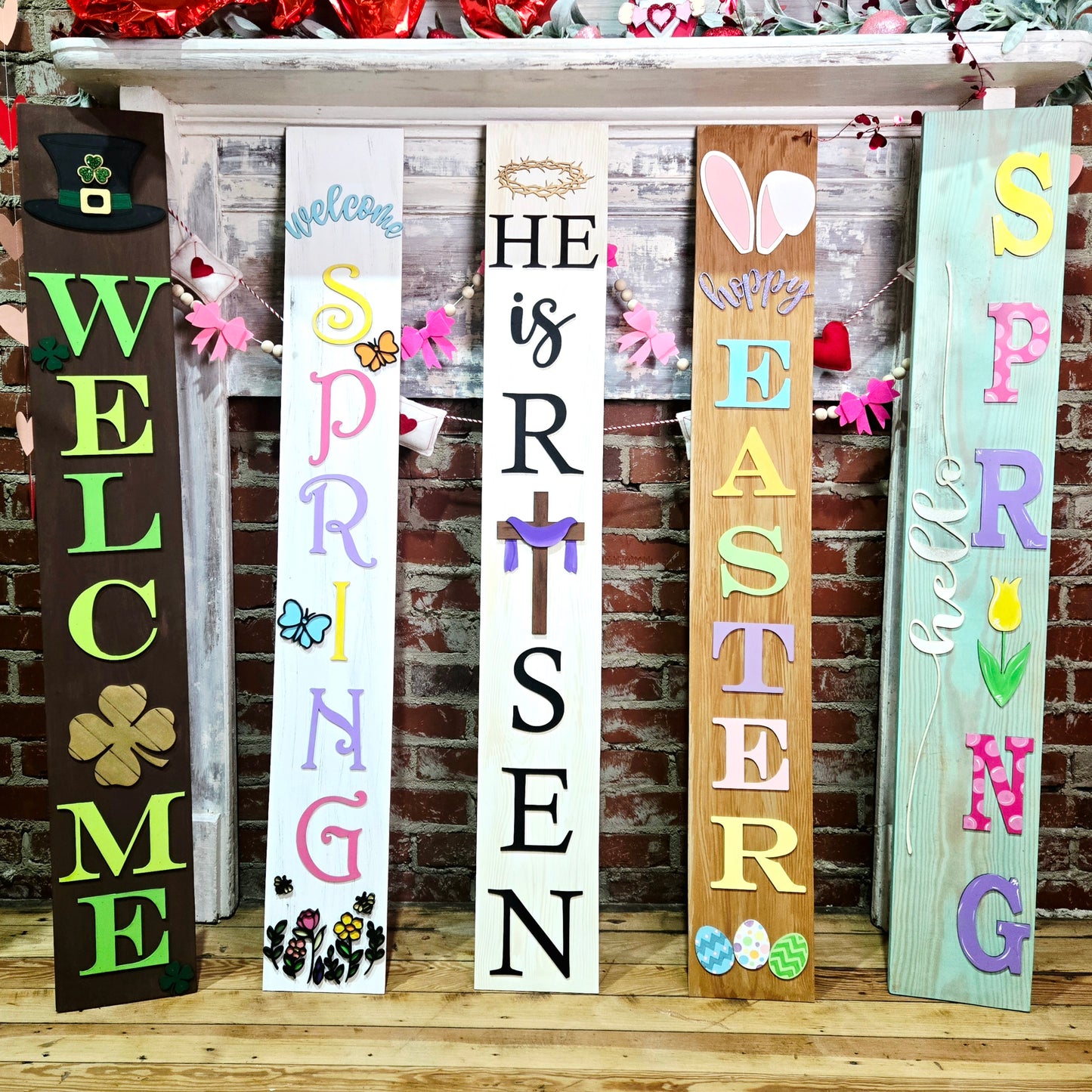Set of wooden signs with Easter and spring-themed text and graphics on a decorative background.